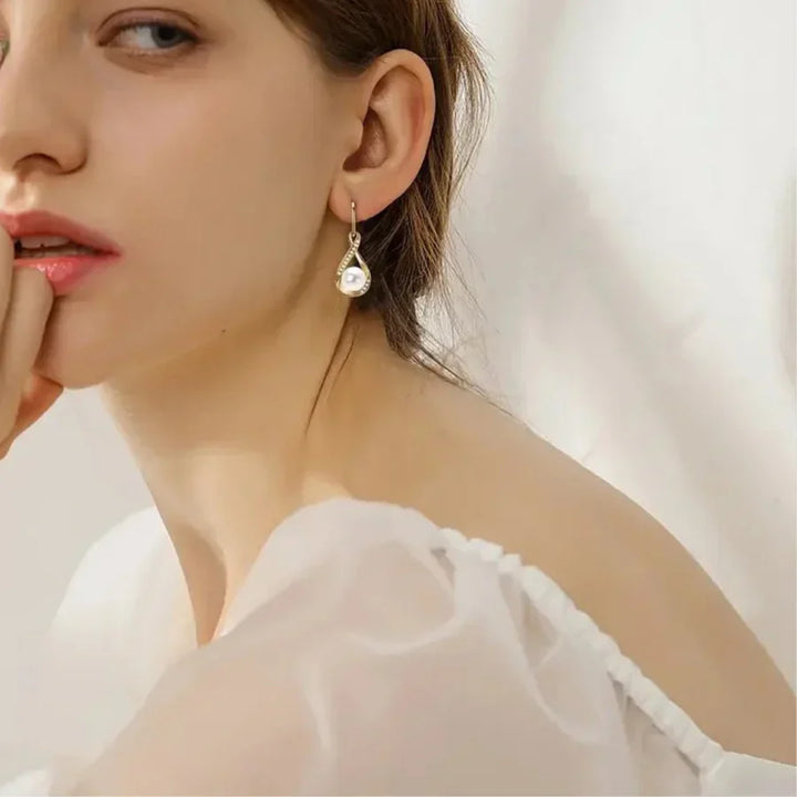 Pendientes de perla en dorado