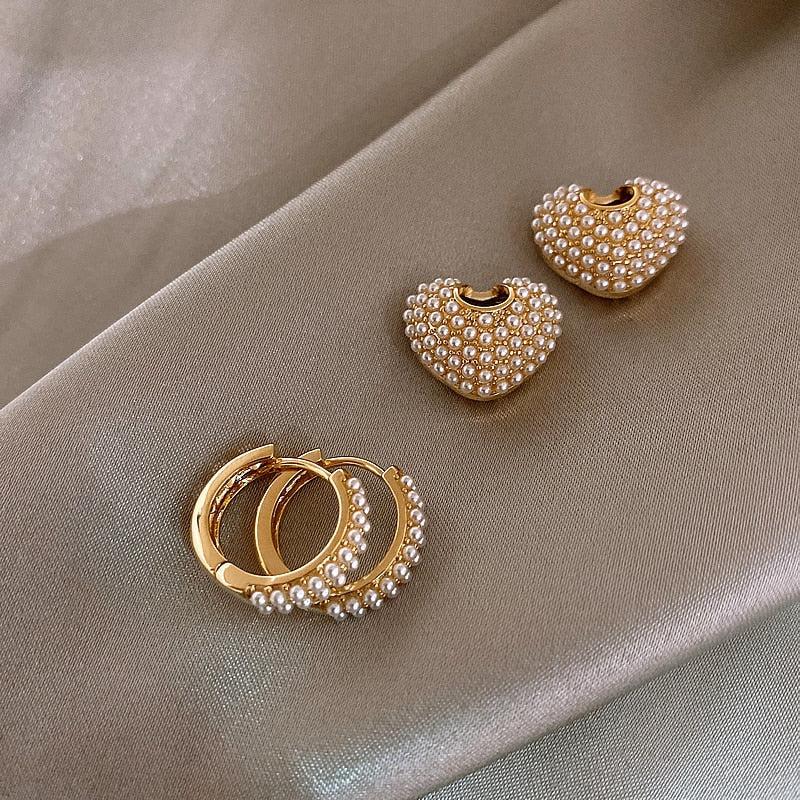 Pendientes de perlas del amor en oro