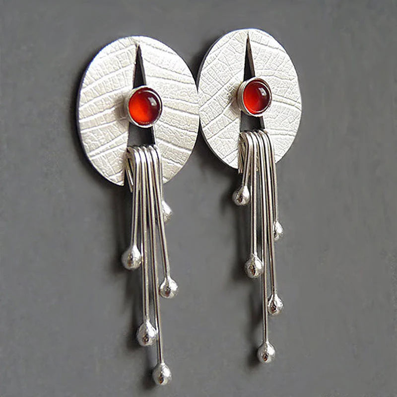 Pendientes colgantes con piedra roja Oca